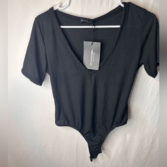 NWT PrettyLittleThing Plus Black Ribbed Plunge Short Sleeve Bodysuit Size 12 - Picture 5 of 15